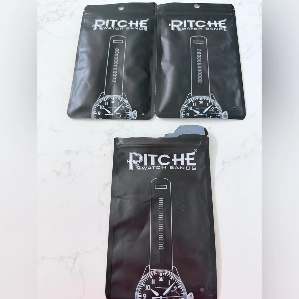 3 pack of Ritche Watch Strap Green,Tan,Black.1 pack is open and 2 pack sealed